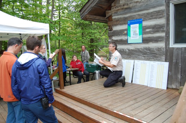 Birders report their findings to Tobi, who records info on the master lists. S. Gray photo